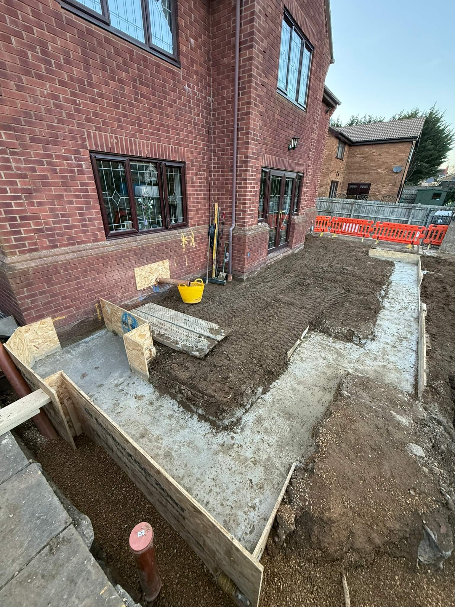 A close up side view of the flooring being changed during the construction