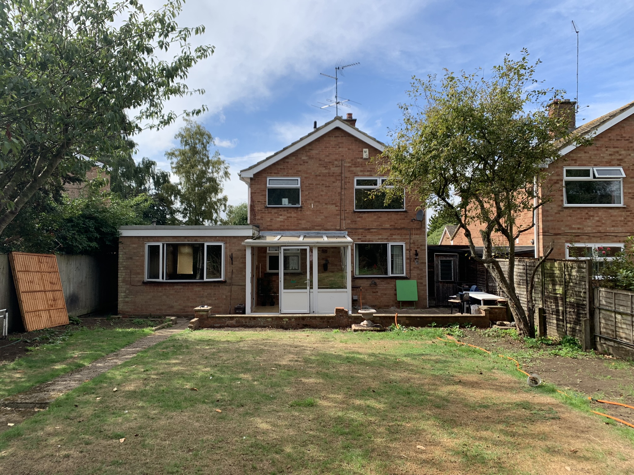 A long shot picture of the rear garden area